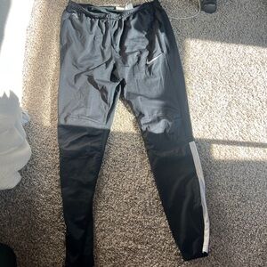 Nike Black Joggers with White Stripe